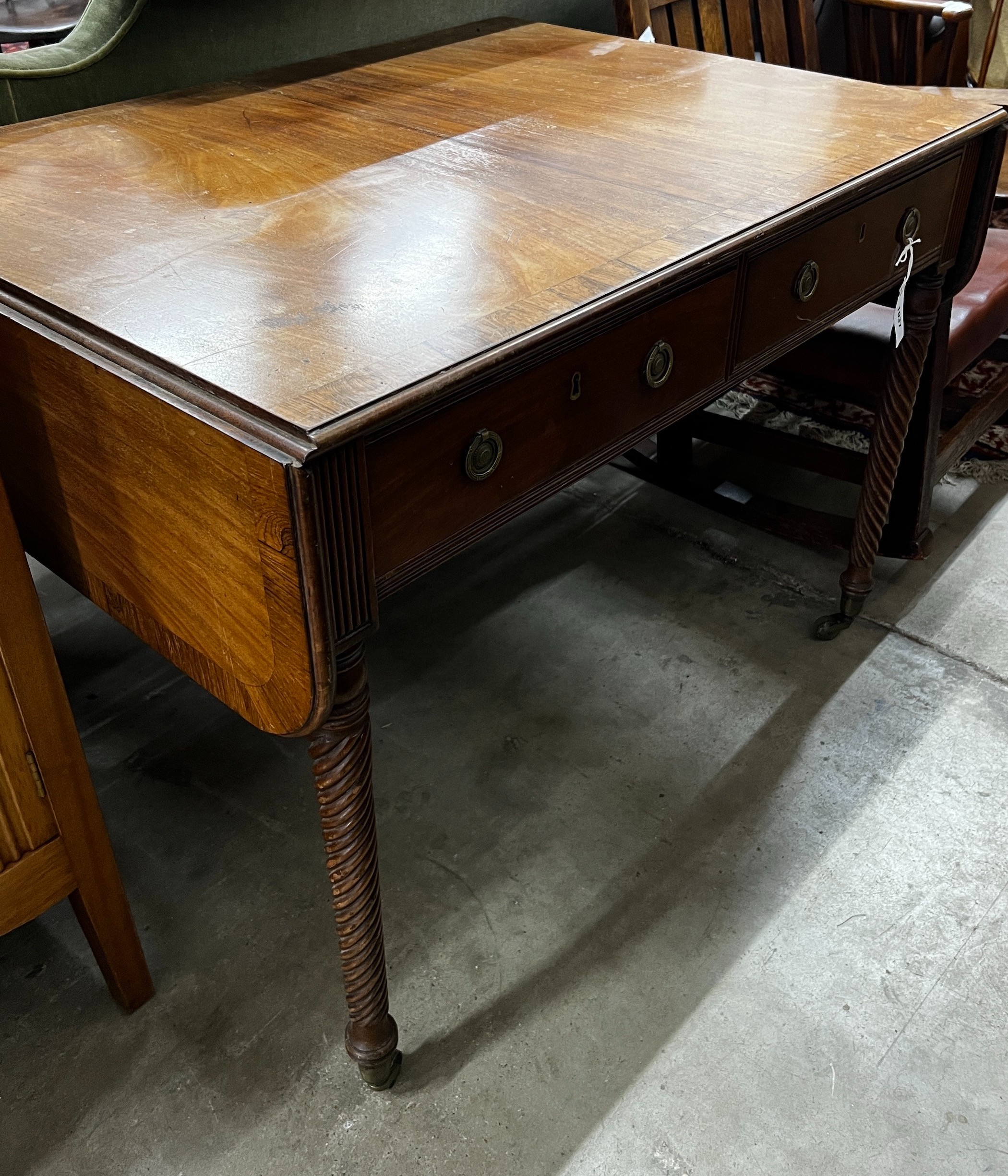 A Regency rosewood banded mahogany sofa table, width 102cm, depth 76cm, height 76cm
